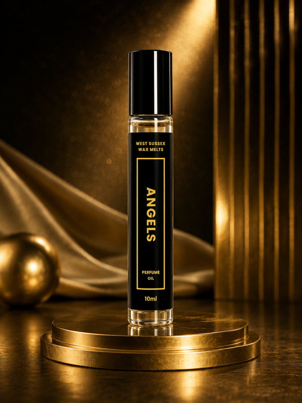 Perfume oil bottle in the scent 'ANGELS' on a reflective surface with a warm glow